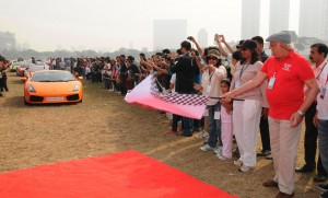 Mr Vijaypath Singhania flagging off the 5th Super Car Show